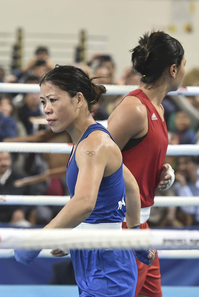  Boxer Mary Kom during her bout against Nikhat Zareen in the 51kg category finals of the women's boxing trials for Olympics 2020 qualifiers. (PTI Photo)