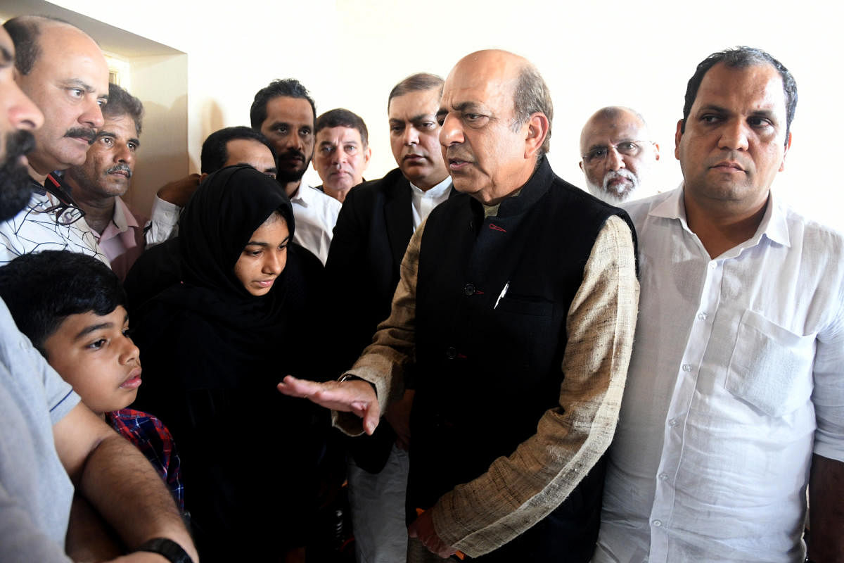 TMC leaders Nadimul Haque and Dinesh Trivedi meet the family members of Jaleel, who was killed in police firing during a protest against Citizenship (Amendment) Act, at Kandak in Mangaluru on Saturday. DH Photo  