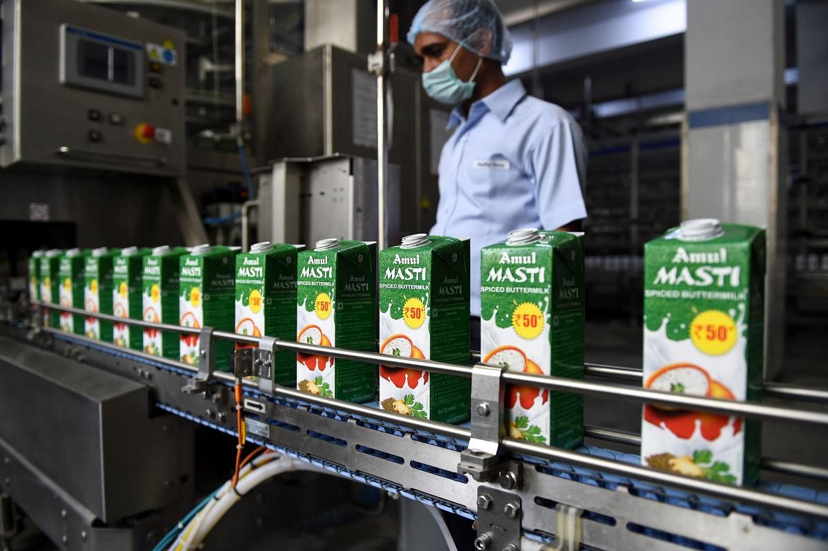 The complaint was registered in Prayagraj district of Uttar Pradesh against a resident of Prayagraj, uploaded a misleading video on social media platforms claiming that the Amul Gold milk curdles because it contains plastic and could be poisonous. Photo/AFP