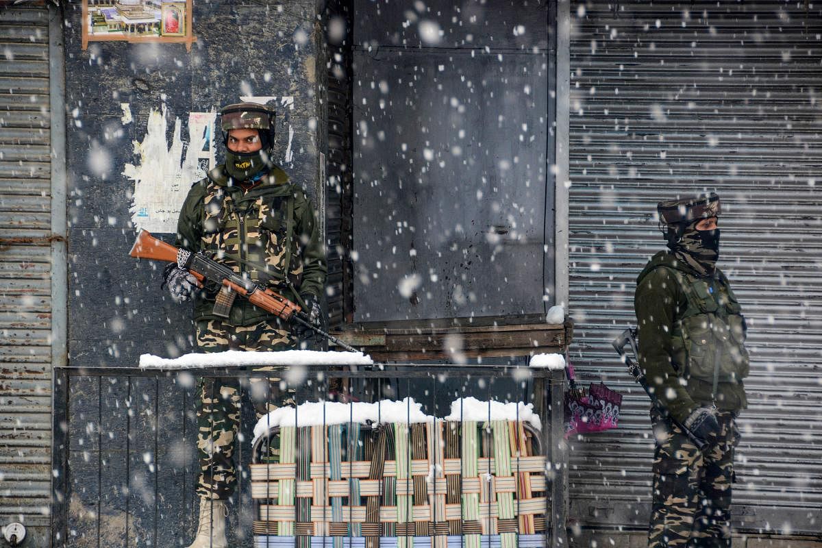 Security personnel stand guard (PTI Photo)