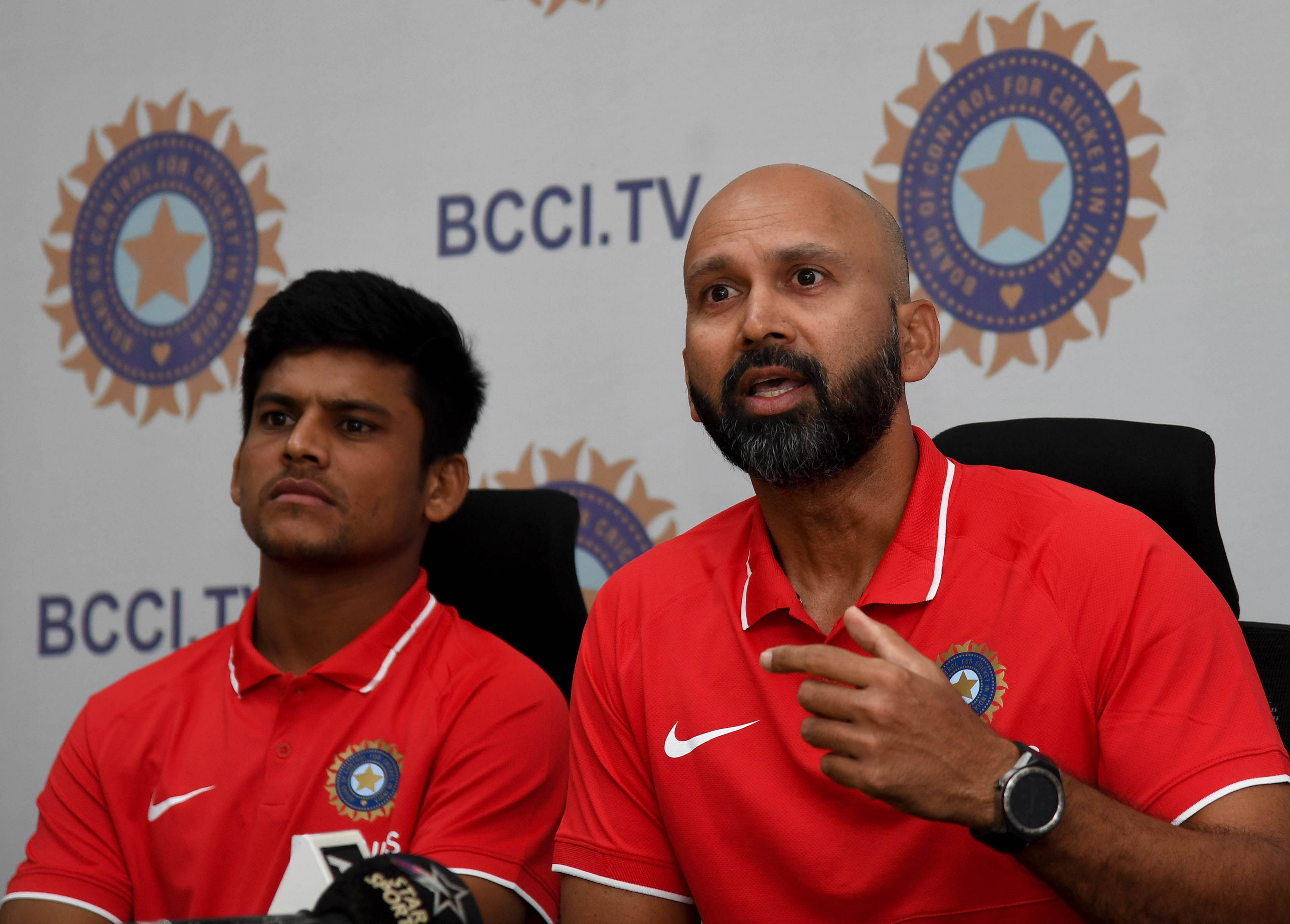 Head Coach(Right) and  Priyam Garg, Captain of Indian Team Under-19 Cricket are seen during the Pre-departure press conference on World Cup 2020. (DH Photo)