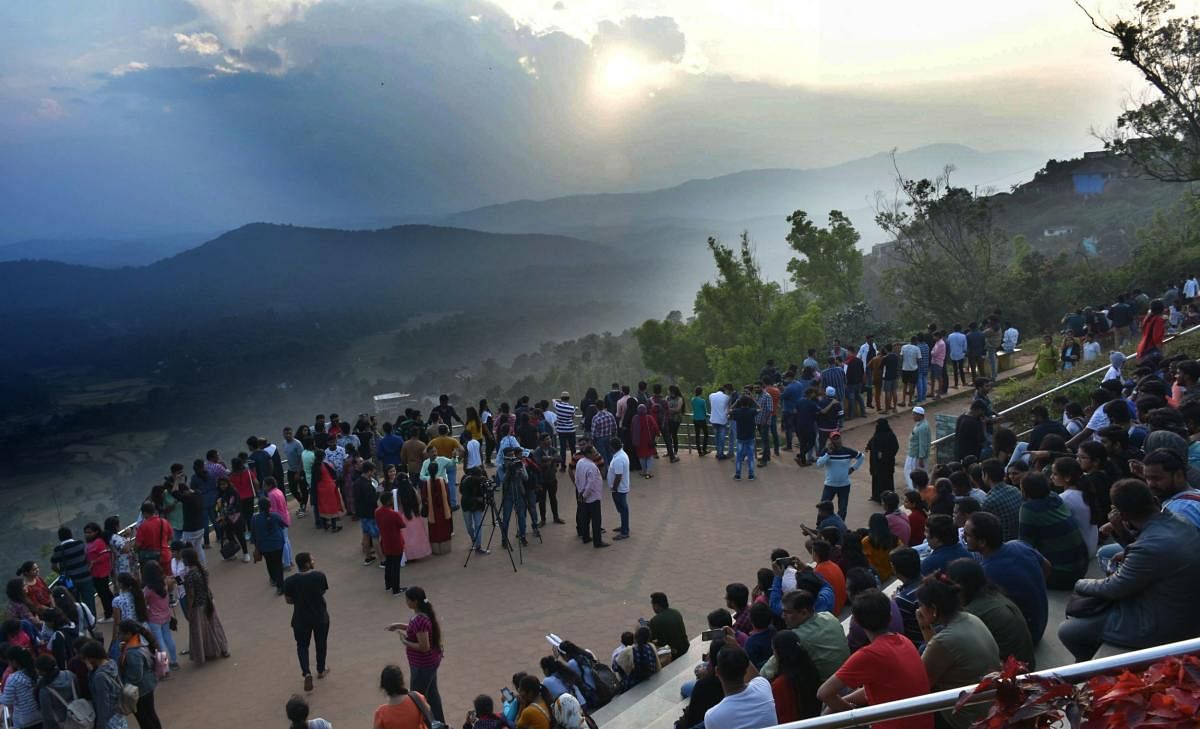 People witness the last sunset of 2019, at the viewing point in Raja Seat on Tuesday evening.