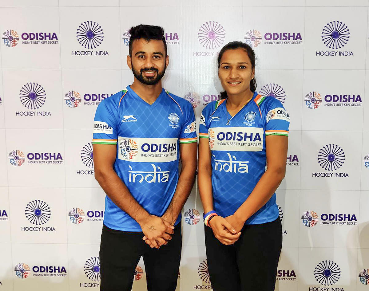 Manpreet Singh and Rani Rampal, skippers of India's men's and women's hockey teams selected for FIH Hockey Olympics Qualifiers Odisha, pose for photographs in Bhubaneswar, Odisha, Friday, Oct. 18, 2019. (PTI Photo)
