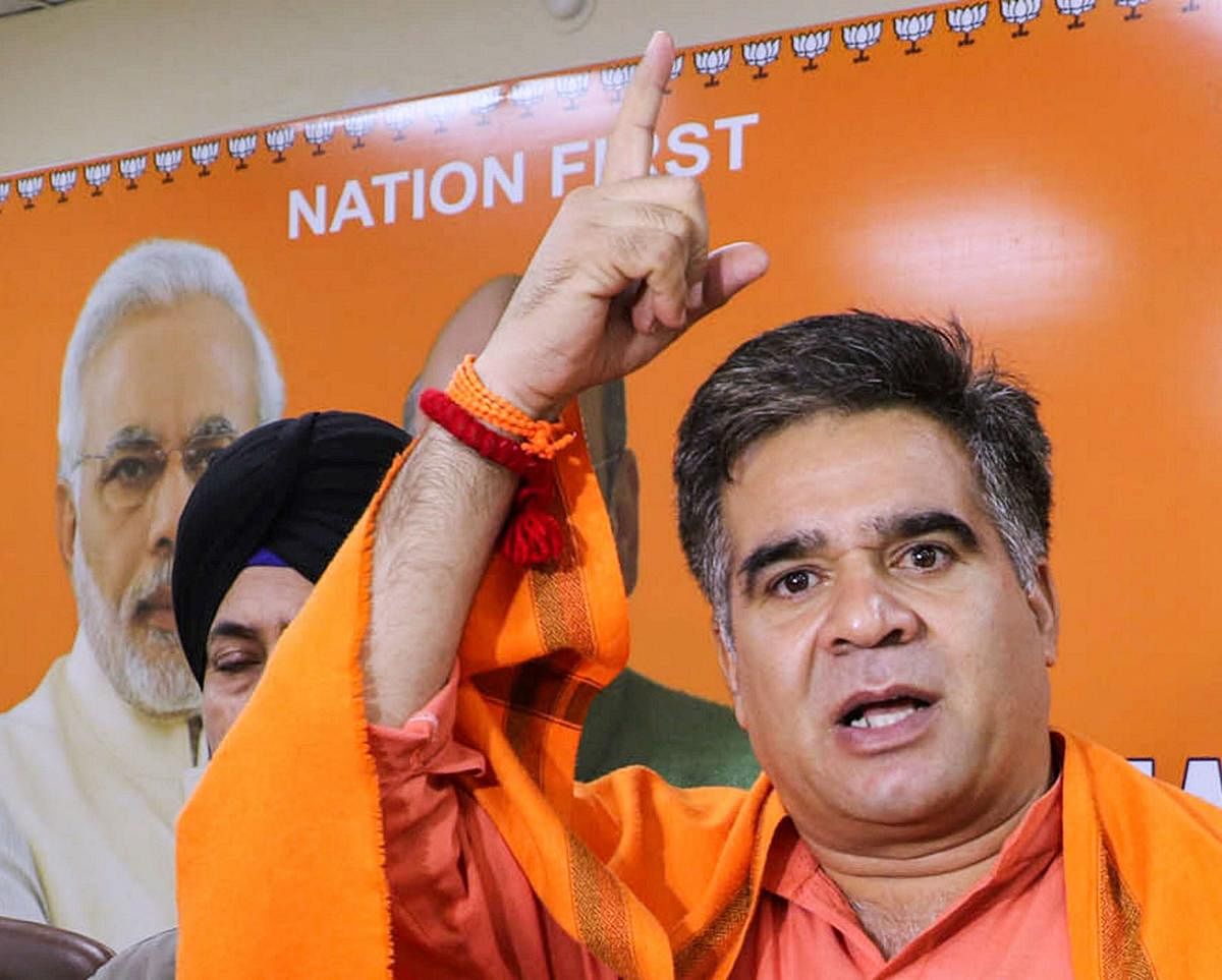 Ravinder Raina avoided a direct answer to whether the BJP government was planning to grant domicile certificates to residents of J-K and Ladakh for the protection of their land and government jobs. PTI