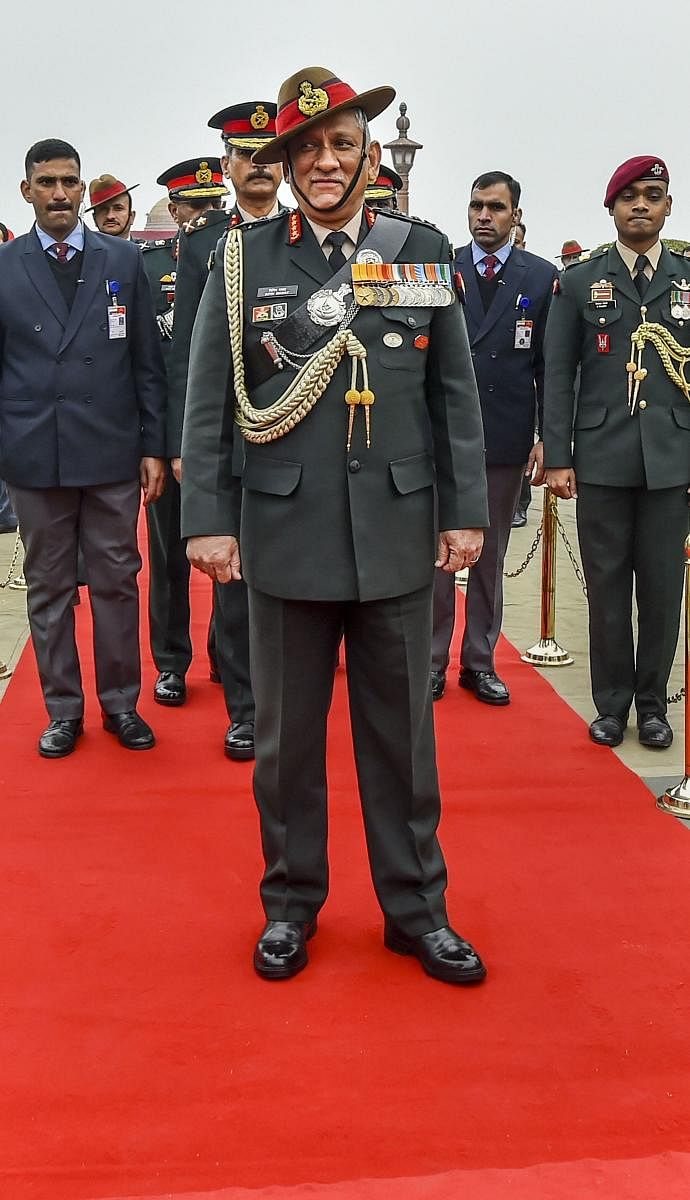 India's first Chief of Defence Staff (CDS) Gen Bipin Rawat poses for photographs after inspecting the Guard of Honour at South Block lawns in New Delhi. PTI
