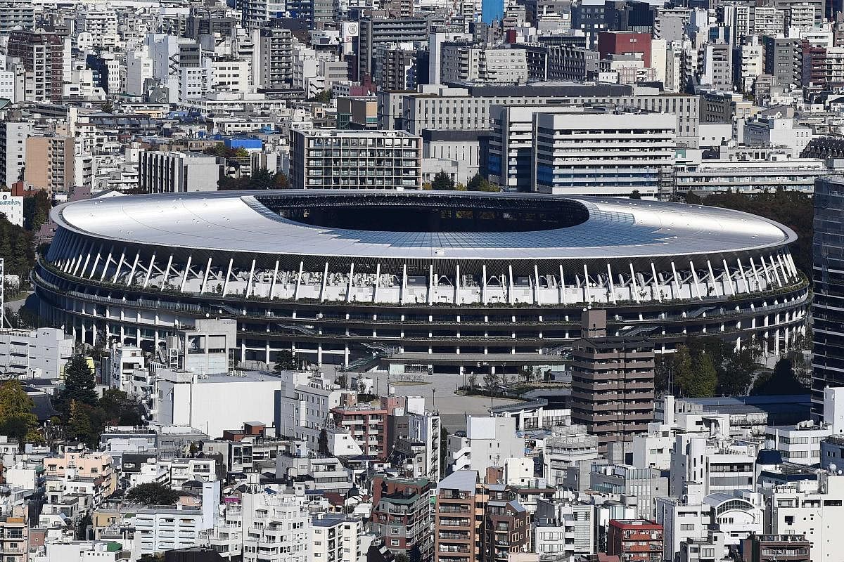 The new 1.4 billion USD main venue for the 2020 Tokyo Olympic Games is pictured after being officially completed in Tokyo. The five-story stadium, designed by renowned Japanese architect Kengo Kuma, will seat 60,000 fans and nods to traditional techniques