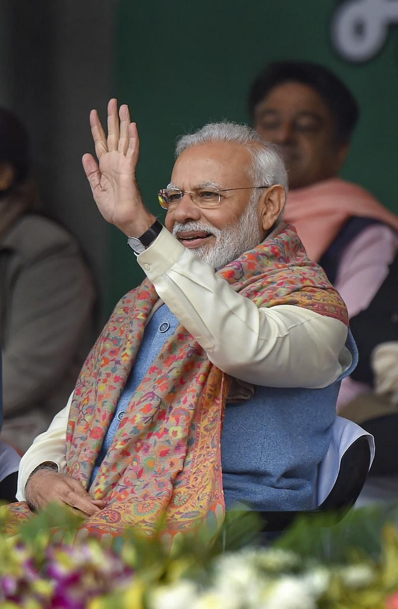 "May everyone be healthy and may everyone's aspirations be fulfilled," PM Modi wrote on Twitter. Photo/PTI