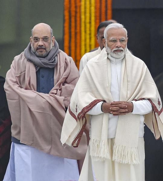  Prime Minister Narendra Modi and Home Minister Amit Shah, arrive to pay tributes to former prime minister A B Vajpayee on his 95th birth anniversary at his memorial, Sadaiv Atal,, in New Delhi, Wednesday, Dec. 25, 2019. (PTI Photo/Kamal Kishore)