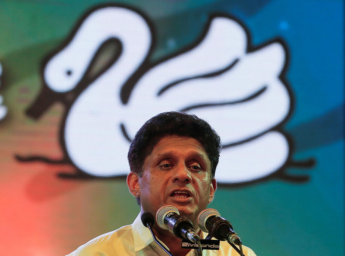 Sajith Premadasa, Sri Lanka's presidential candidate of the ruling United National Party (UNP) led New Democratic Front alliance speaks to his supporters during an election campaign rally. (PTI Photo)