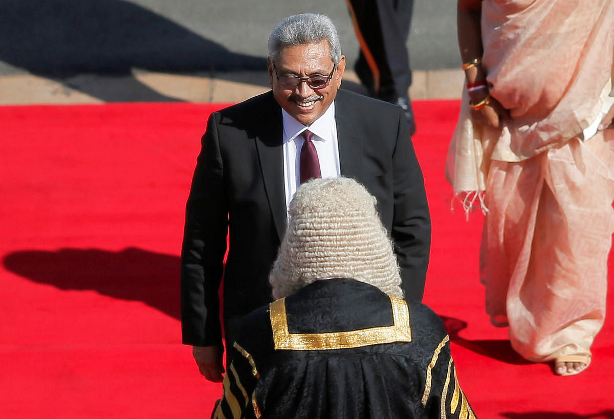 Sri Lankan President Gotabaya Rajapaksa arrives to deliver his speech at parliament. Reuters