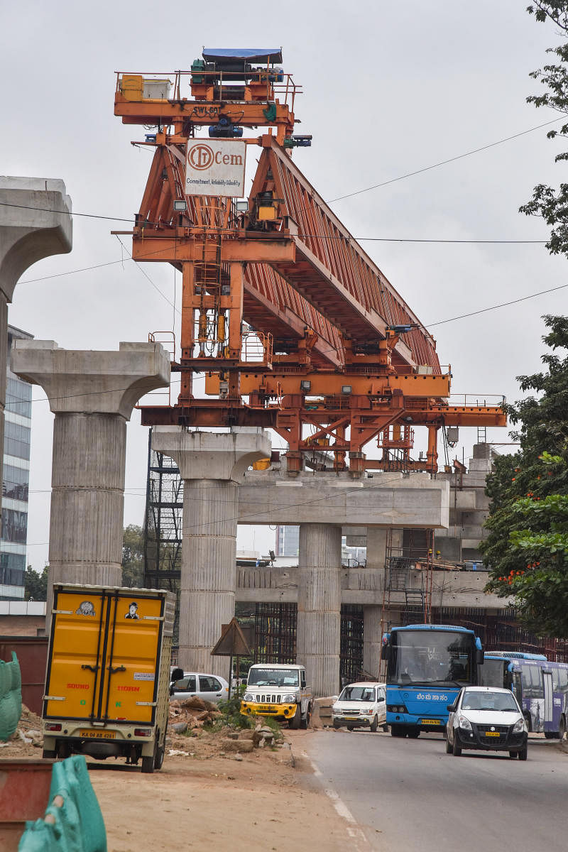 Namma Metro rail line construction work is going on at Whitefield in Bengaluru on Sunday. Photo by S K Dinesh
