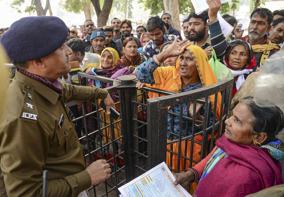 People protest at the JK Lon hospital, where at least 100 infants have died in the month of December (Photo Credit: PTI)