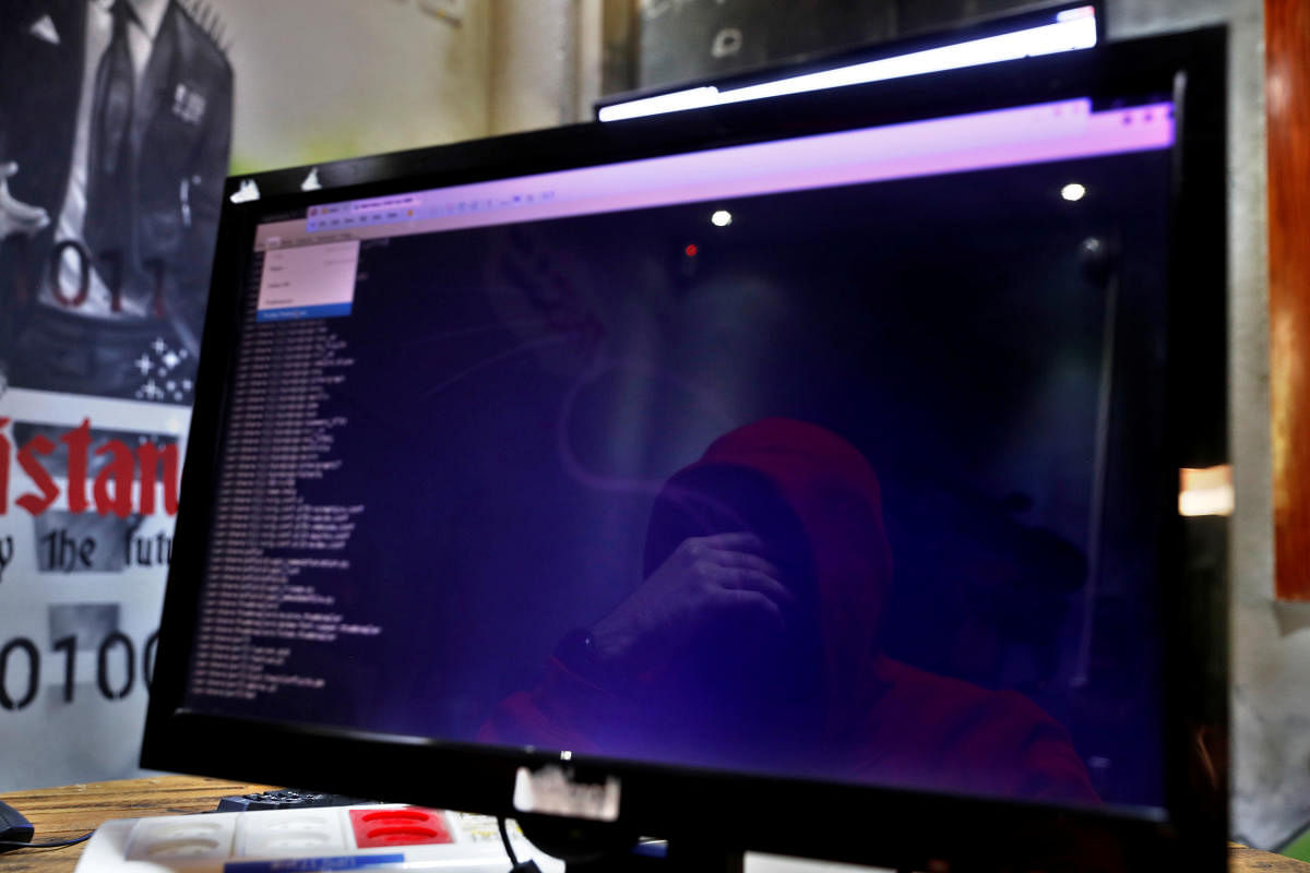 A man is reflected in a monitor as he takes part in a training session at Cybergym, a cyber-warfare training facility backed by the Israel Electric Corporation, at their training center in Hadera, Israel July 8, 2019. (Reuters Photo)