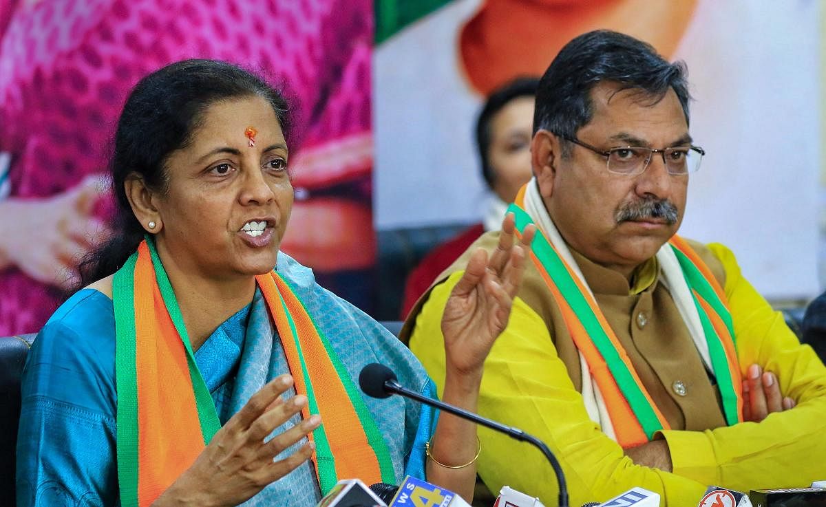Union Finance Minister Nirmala Sitaraman with Rajasthan BJP President Satish Poonia addresses media during a press conference over the launch of 'Jan Jagran Campaign' in support of CAA , at BJP office in Jaipur, Jan. 5 , 2020. (PTI Photo