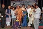 Seer Veereshananda Swamiji of Ramakrishna Vivekananda Ashram inaugurating the State-level light music programme at Gubbi Veeranna Ranga Mandira in Tumkur on Thursday. Music and Dance Academy chairman Narasimhalu Vadavati is also seen