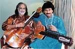 Indian guitar maestro Pt Vishwa Mohan Bhatt (left) with his son Salil V Bhatt before a rare concert in London on Sunday. IANS