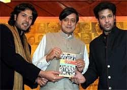 Minister of State for External Affairs Shashi Tharoor (centre) launches the '50 Maestros Recordings' with Sarod players Ayaan Ali Khan (left) and Amaan Ali Khan (right) in New Delhi on Monday. PTI
