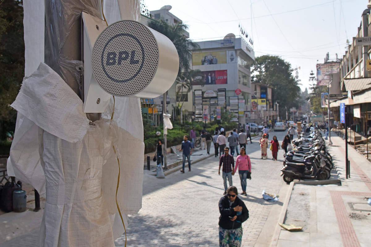 Church Street, which is renovating under the Tender SURE project to have audio speakers, playing classical music from morning to evening. BPL company has sponsored speakers which are been attached to the street light poles in Bengaluru on Monday. Photo by S K Dinesh