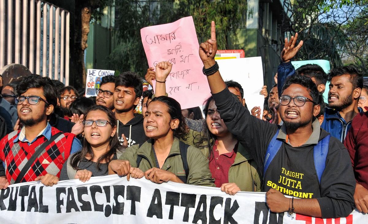  Students of Jadavpur University participate in a rally to protest against Sunday's attack on JNU students and its campus. (PTI Photo)