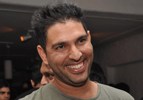 Cricketer Yuvraj Singh at the launch of ' THE COLLECTIVE' style book, in Mumbai on Saturday night. PTI Photo