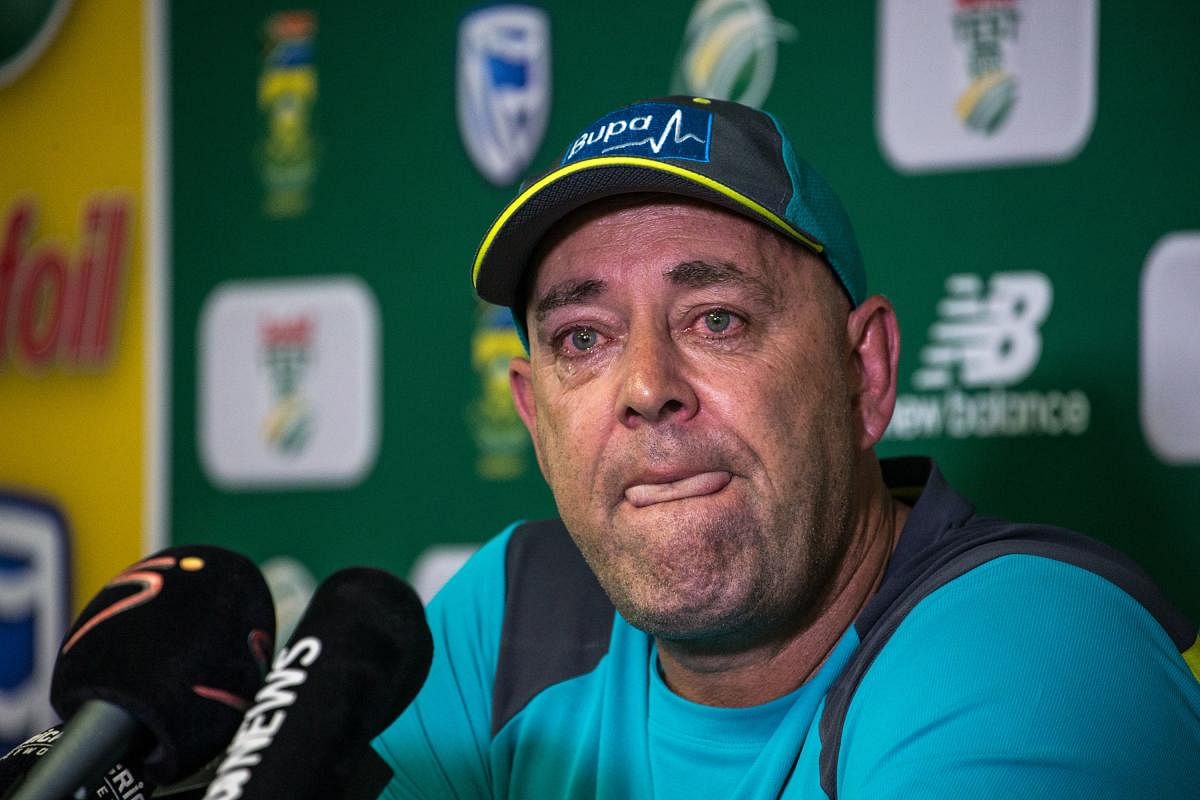Darren Lehmann speaks to the press as he announces he will resign as Australian cricket coach after the coming Test match on March 29, 2018 in Johannesburg. (AFP Photo)