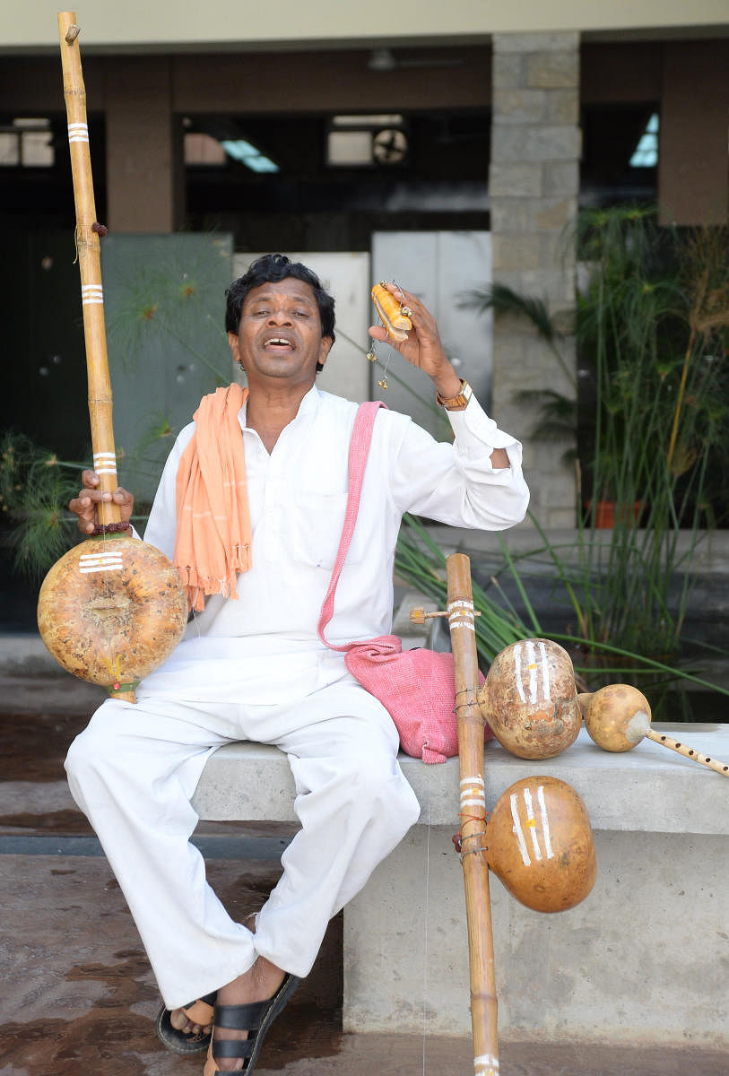 Gifted: Folk musician Ramaiah rendering a song. photo by satish badigeryxy. dh photo Sathish Badiger