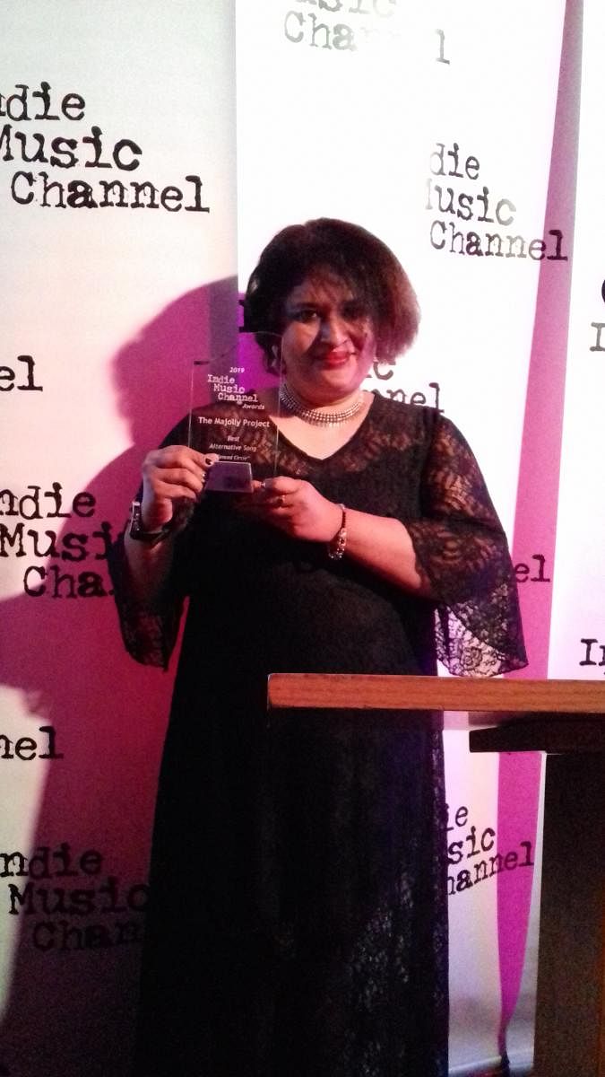Neecia Majolly with the ‘Best Alternative Song’ award at the Indie Music Channel Awards, Hollywood.