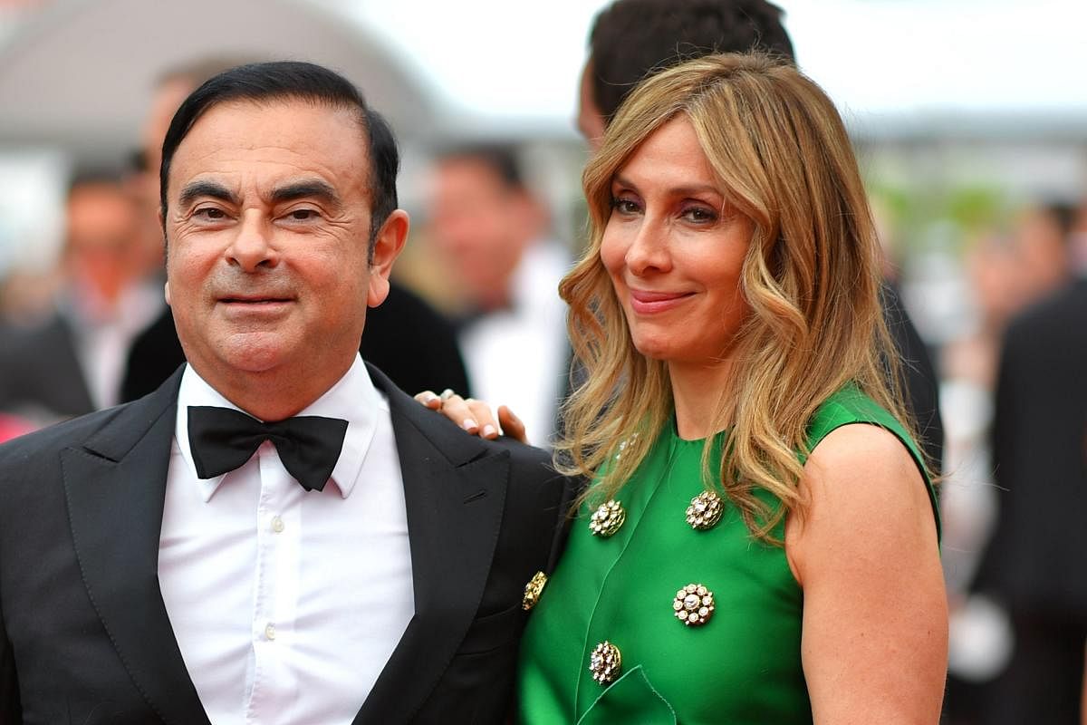 Carlos Ghosn (L) and his wife Carole arriving at the 70th edition of the Cannes Film Festival in Cannes. AFP file photo