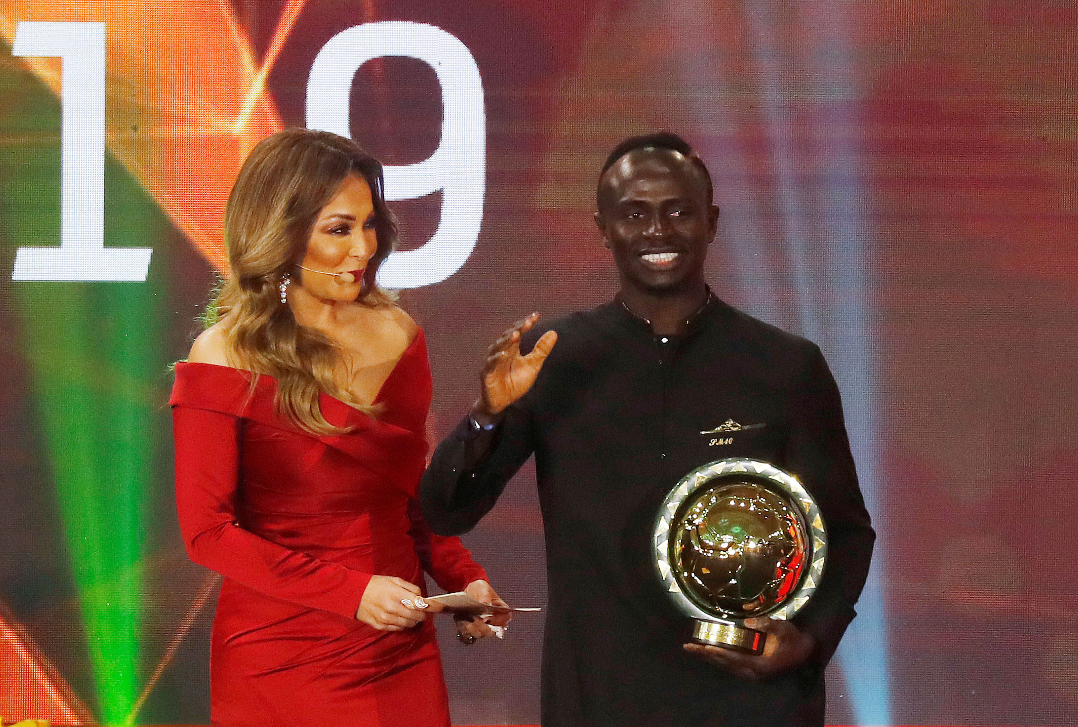 Senegal's Sadio Mane receives the men's player of the year award. (Reuters Photo)