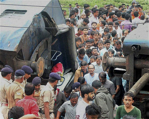 Madhya Pradesh Chief Minister Shivraj Singh Chouhan inspect the accident site of Kamayani Express and Janata Express trains were derailed within minutes of each other while crossing a small bridge, in Madhya Pradesh on Wednesday. PTI Photo