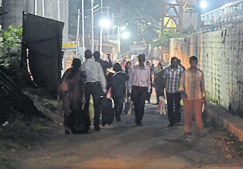 Lights are switched on only for one or two hours in the evening. After 9 pm, no lights are on, leaving those using the road behind city railway station in Okalipuram fuming. Photo by S K Dinesh