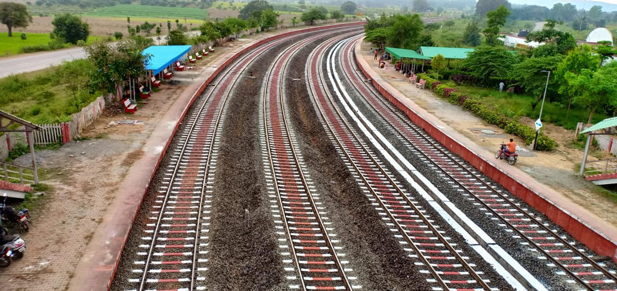 The 10-km railway track near the Mugad Railway Station in Dharwad taluk painted with red and white colour. DH Photo
