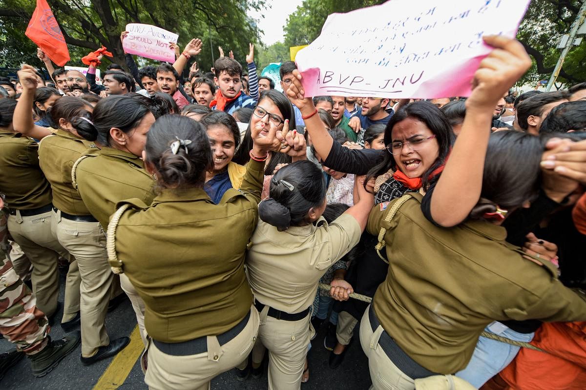 Jawaharlal Nehru University (JNU), Akhil Bharatiya Vidyarthi Parishad (ABVP) and Delhi University Students' Union (DUSU) students clash with police. (PTI photo )