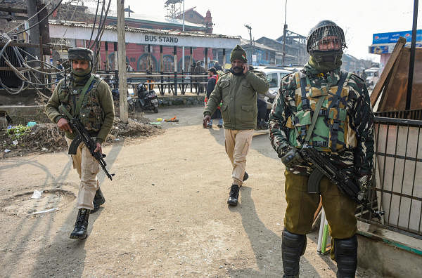Security personnel near the site of a grenade attack at Kawdara in Downtown Srinagar, Saturday, Jan. 4, 2020. (PTI Photo/S. Irfan) 