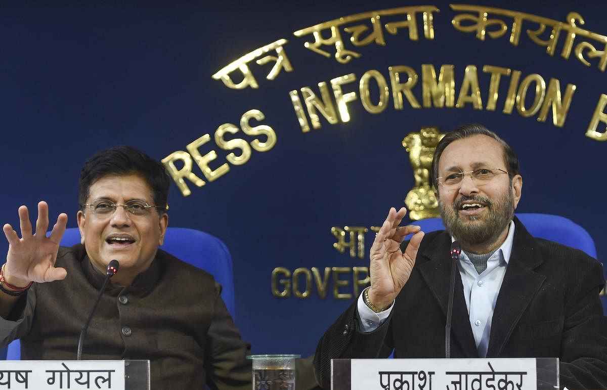 Union Ministers Prakash Javadekar and Piyush Goyal brief the media on cabinet decisions at PIB conference hall. PTI