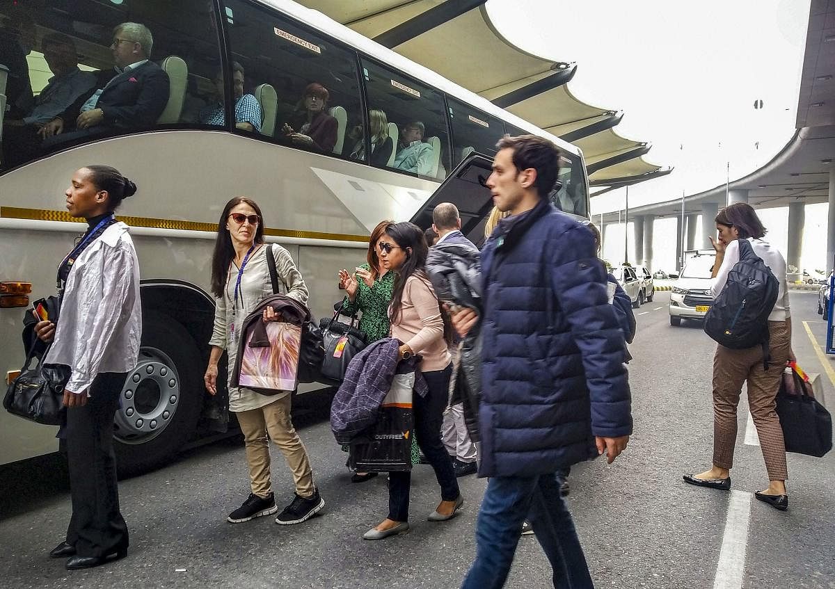  Members of European Union Parliamentary delegation board a bus on their arrival at IGI Airport after their visit to the state of Jammu and Kashmir, in New Delhi, Wednesday, Oct. 30, 2019. (PTI Photo)