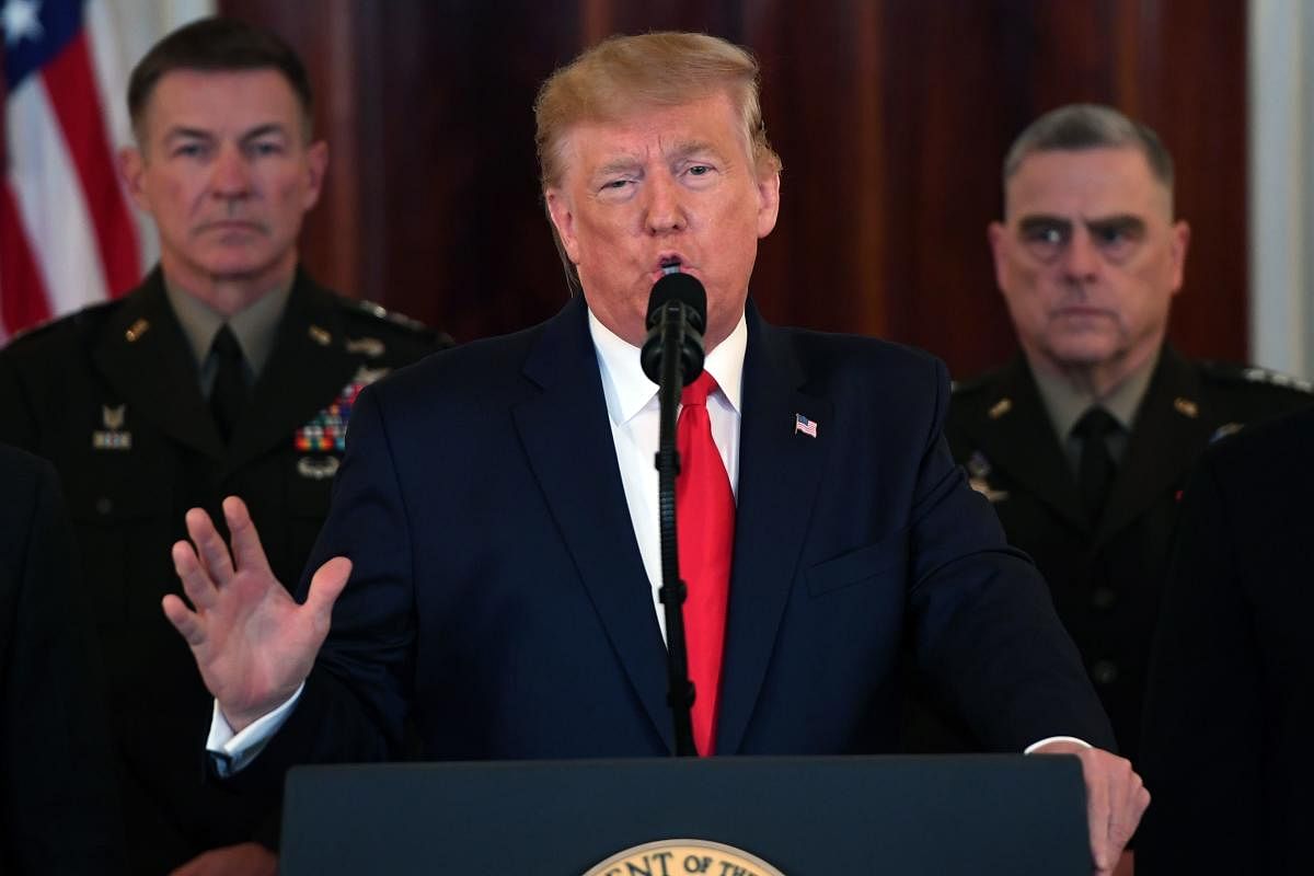 US President Donald Trump speaks about the situation with Iran in the Grand Foyer of the White House in Washington, DC, January 8, 2020. (Photo by SAUL LOEB / AFP)