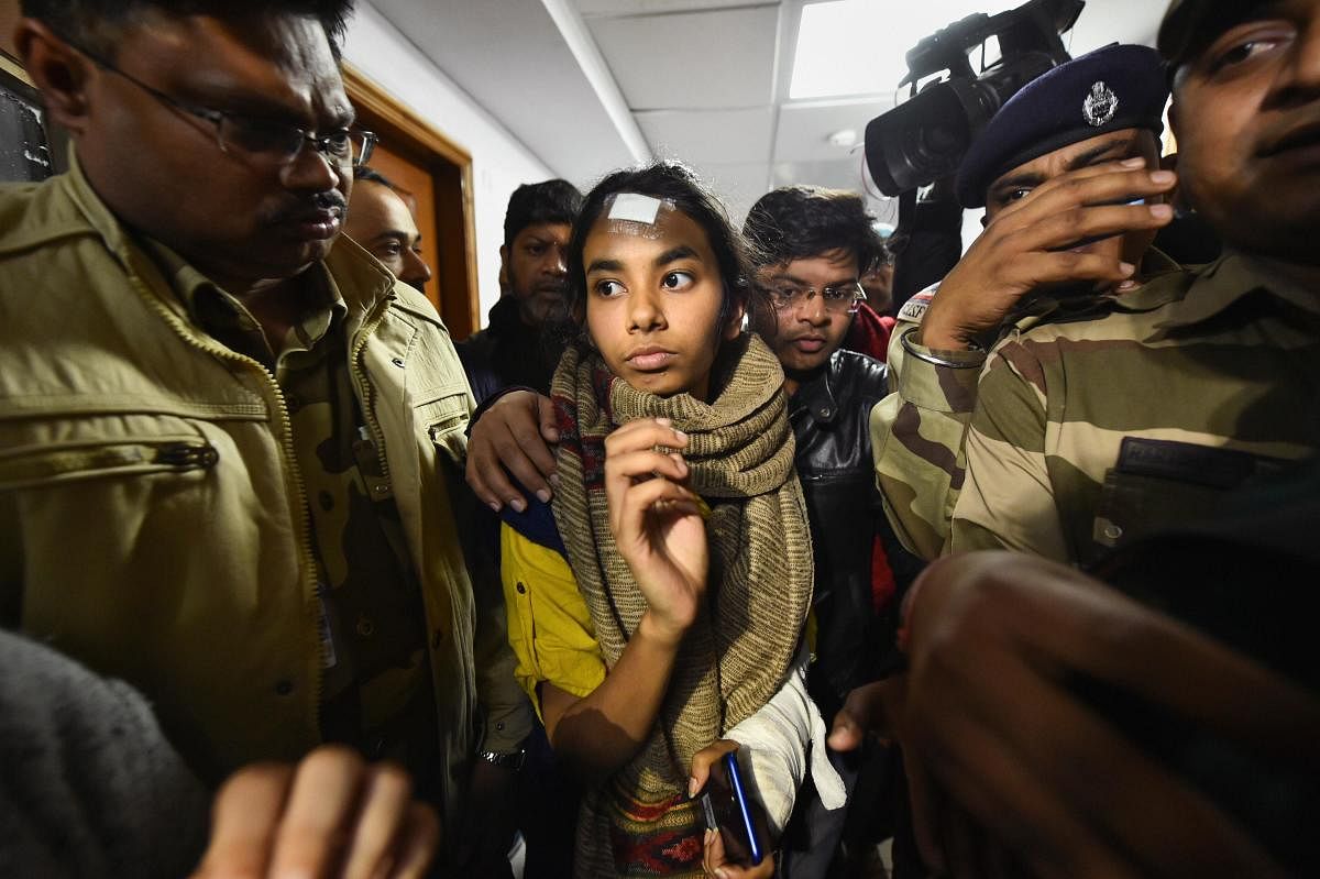 The Police on Friday released pictures of the suspects in the January 5 violence and claimed JNUSU president Aishe Ghosh was one of them. PTI