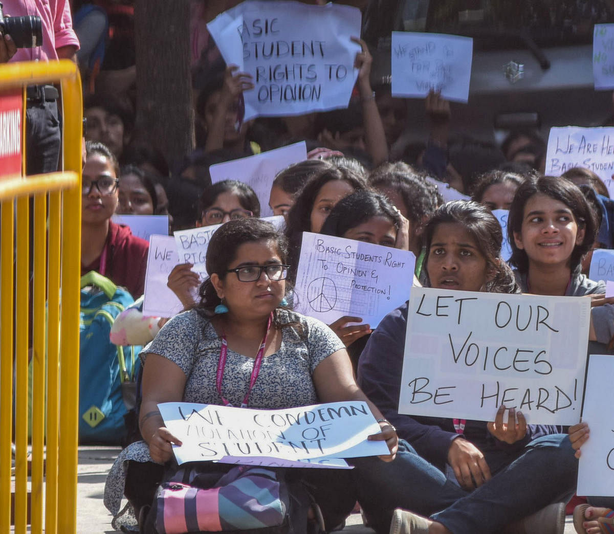 JNC students protest against alleged harassment by BJP workers in Bengaluru on Thursday. DH Photo/S K Dinesh