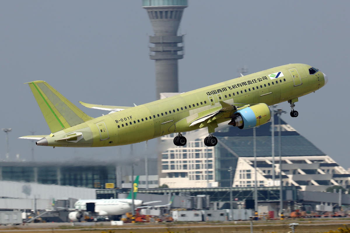 The fifth prototype of China's home-built C919 passenger plane takes off for its first test flight from Shanghai Pudong International Airport in Shanghai, China October 24, 2019. (Reuters Photo)