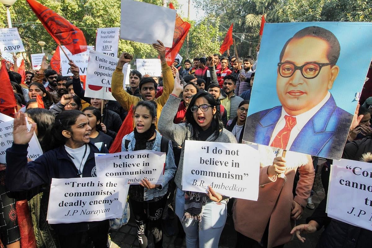  ABVP supporters participate in a rally in support of CAA and NRC, at Delhi Univeristy. (PTI Photo)