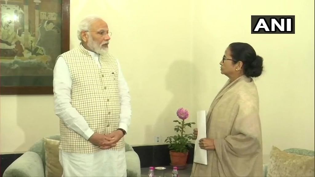 Prime Minister Narendra Modi and West Bengal Chief Minister Mamata Banerjee (ANI Photo)