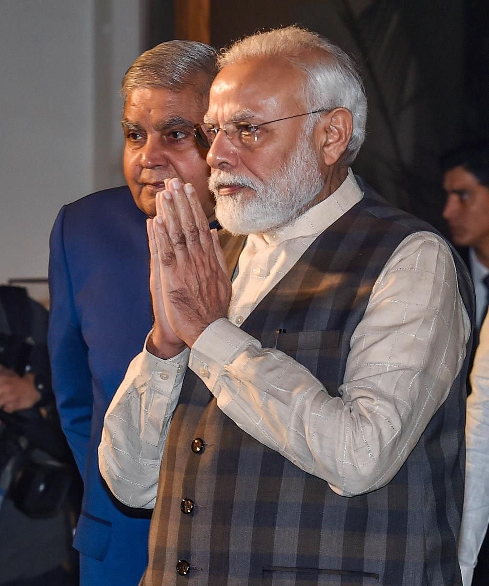 Prime Minister Narendra Modi arrives to unveil an art installation during inauguration of 'Ghare-Baire'- an exhibition of art in Bengal from 18th till 20th century, in Kolkata. PTI