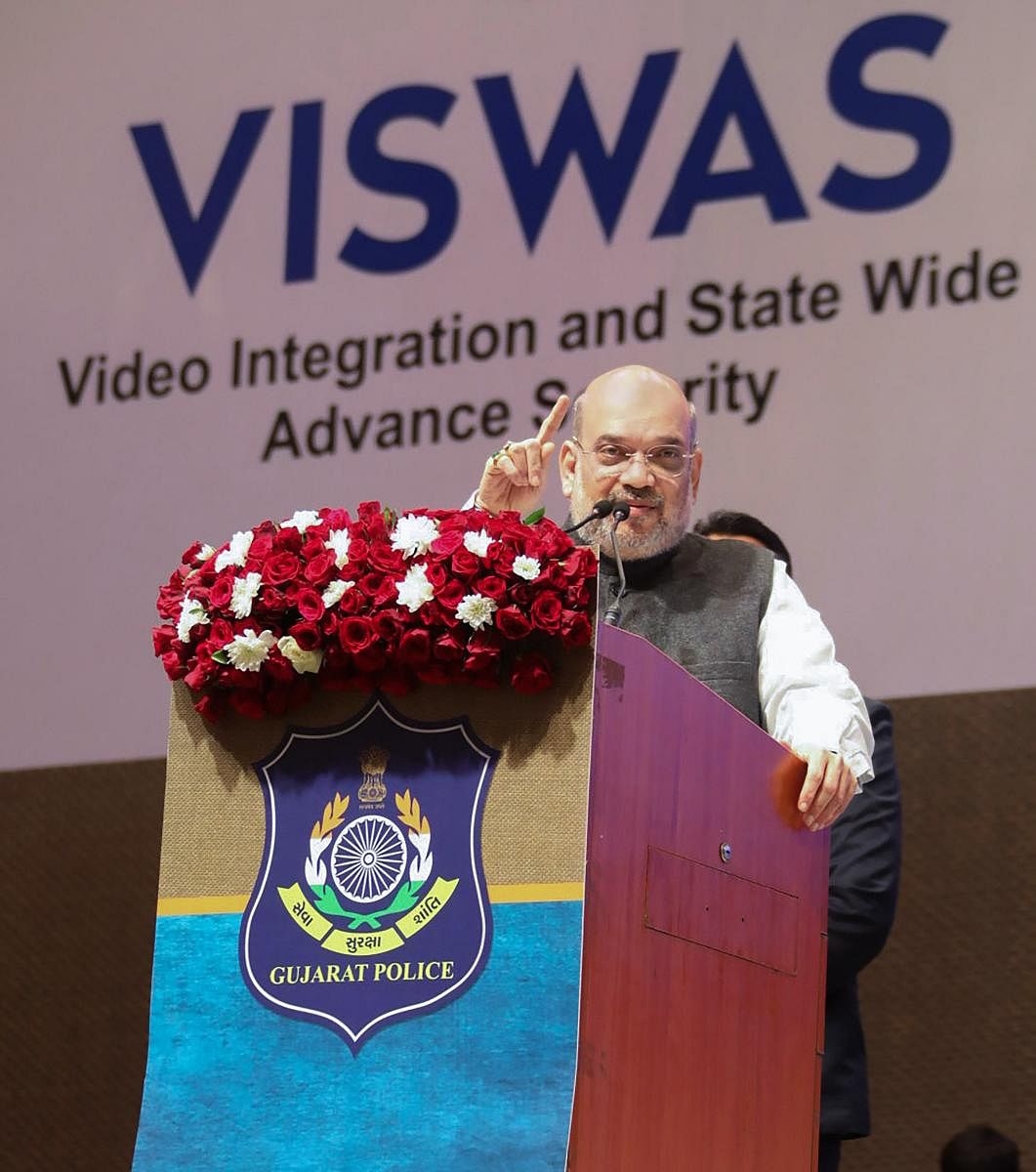  Union Home Minister Amit Shah addresses a gathering at the launch event of the ‘VISWAS (Video Integration and State Wide Advance Security)’Project, in Gandhinagar. PTI