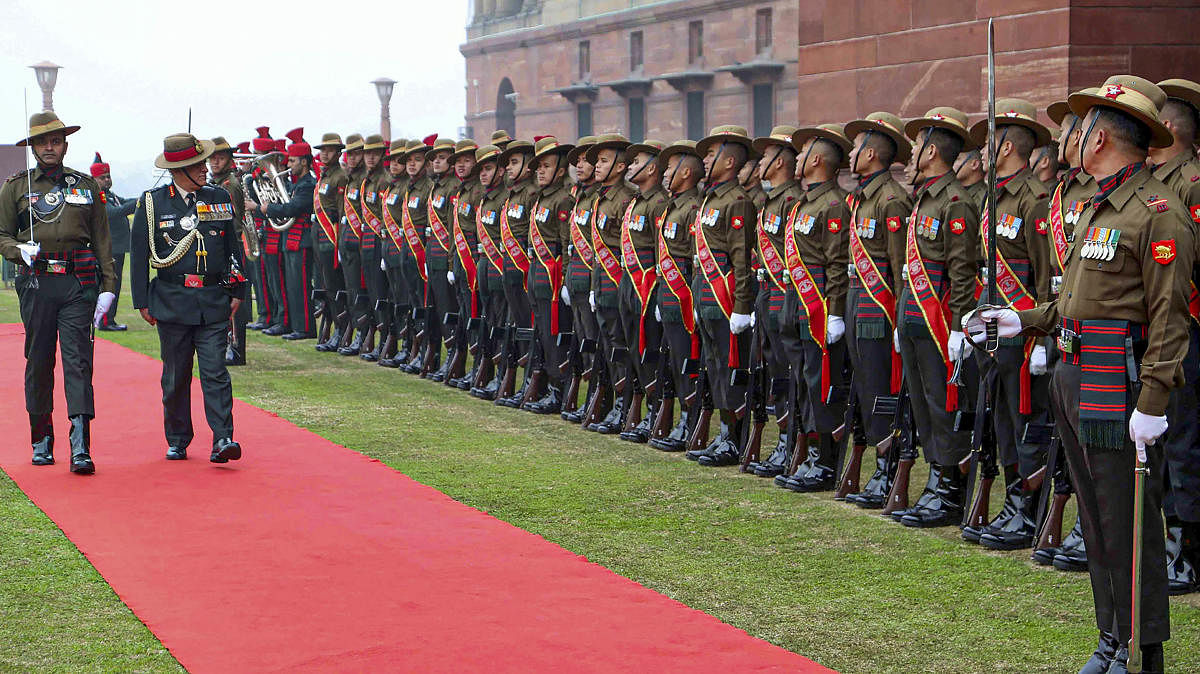 New Delhi: Outgoing Indian Army Chief General Bipin Rawat, who has been appointed as India's first Chief of Defence Staff (CDS), inspects a guard of honour in New Delhi. (PTI Photo)