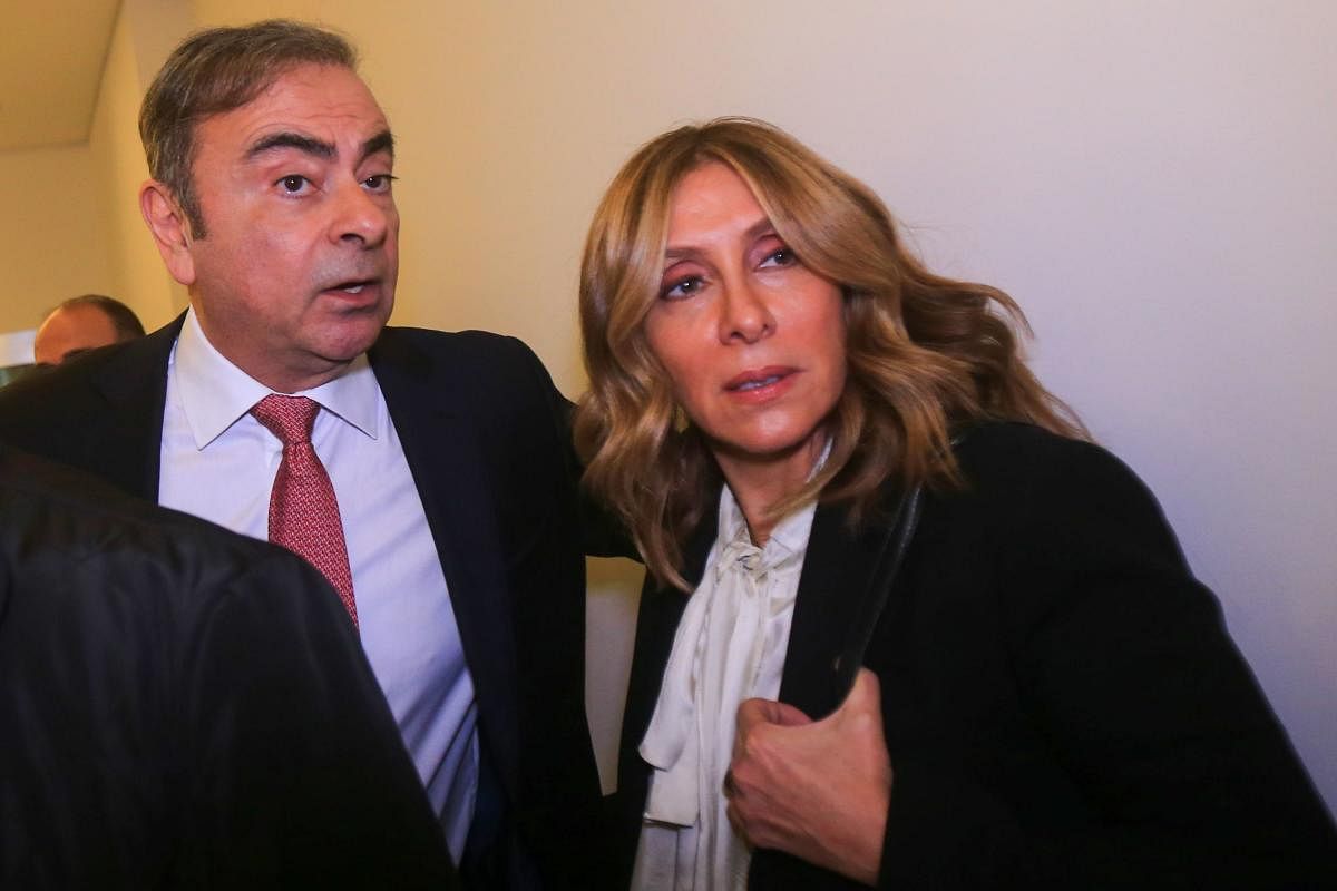 Former Renault-Nissan boss Carlos Ghosn with his wife Carole. (AFP Photo)
