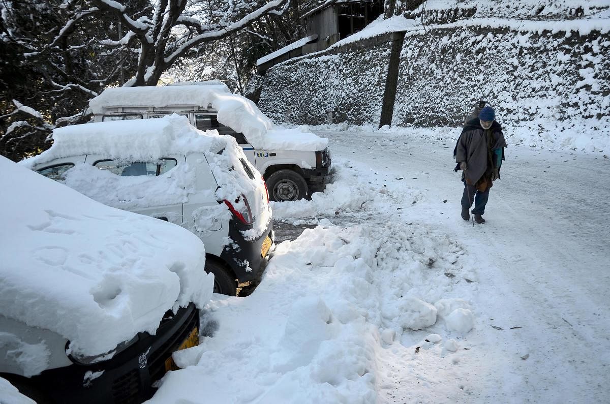 A snow-covered road in Shimla (PTI Photo)