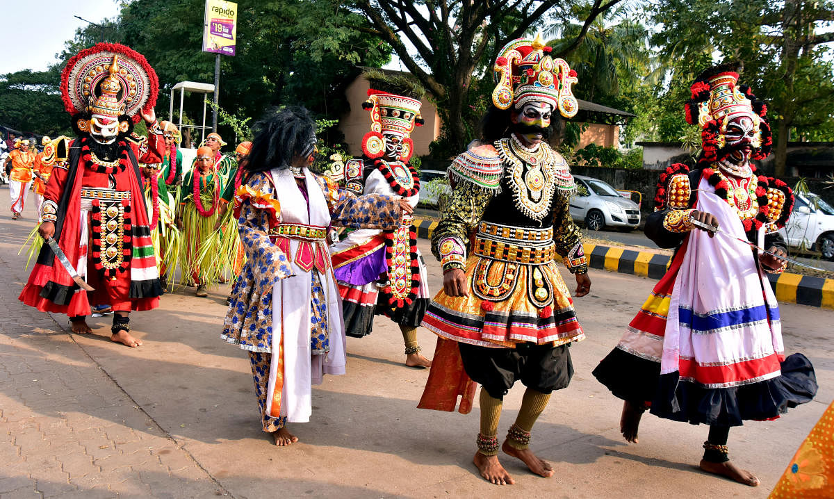 Art troupes performed during the procession held as a part of the Karavali Utsav in Mangaluru on Friday.