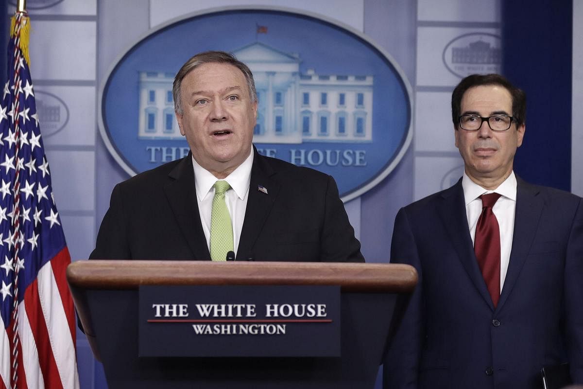 Secretary of State Mike Pompeo and Treasury Secretary Steve Mnuchin brief reporters about additional sanctions placed on Iran, at the White House, Friday, Jan. 10, 2019, in Washington. (AP Photo)