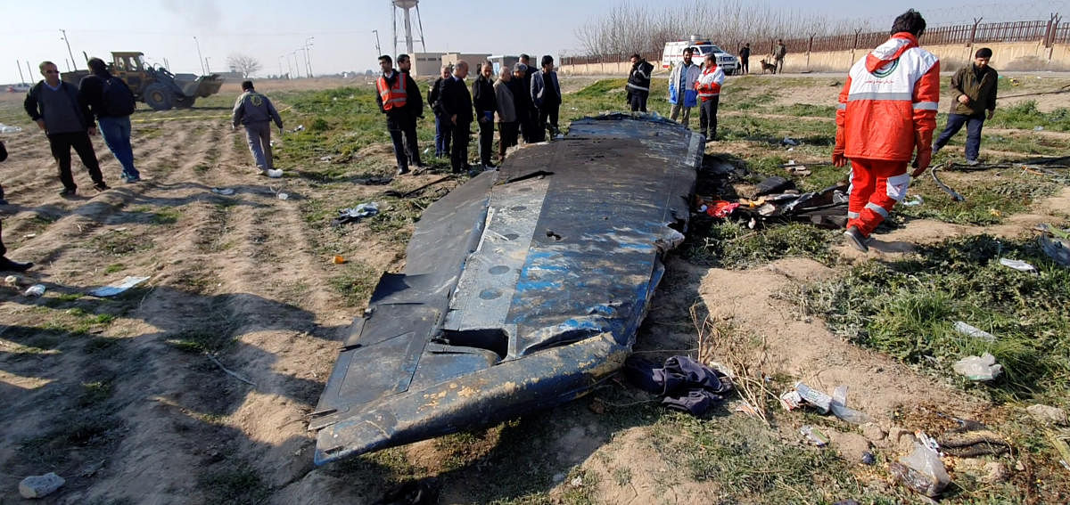 General view of the debris of the Ukraine International Airlines, flight PS752, Boeing 737-800 plane that crashed. (Reuters Photo)